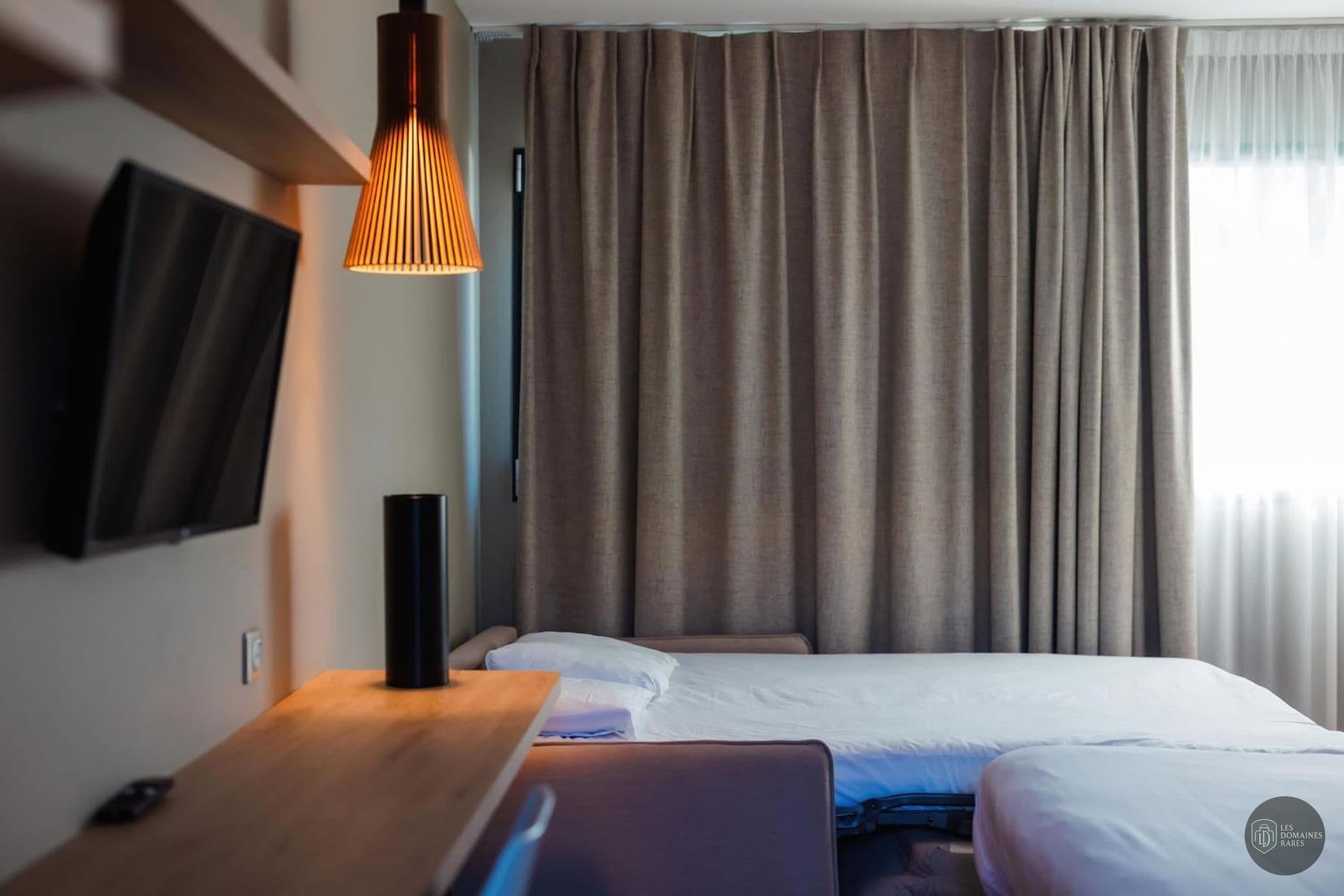 Chambre de l'hôtel Ibis Valence Sud à Valence en Auvergne-Rhône-Alpes - séminaire drôme