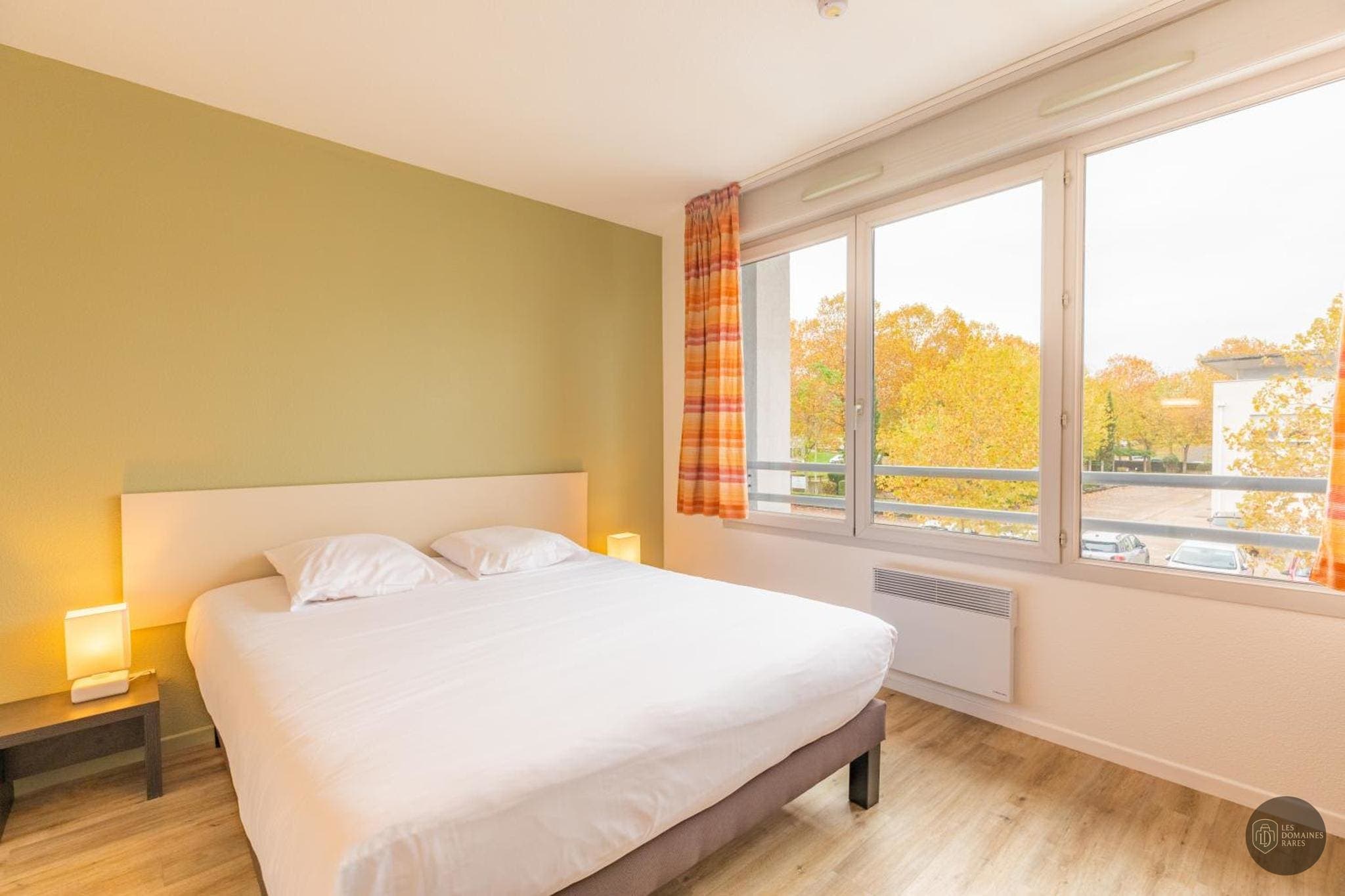 Chambre de l'hôtel Kyriad Bourg-en-Bresse en Auvergne-Rhône-Alpes - séminaire bourg-en-bresse