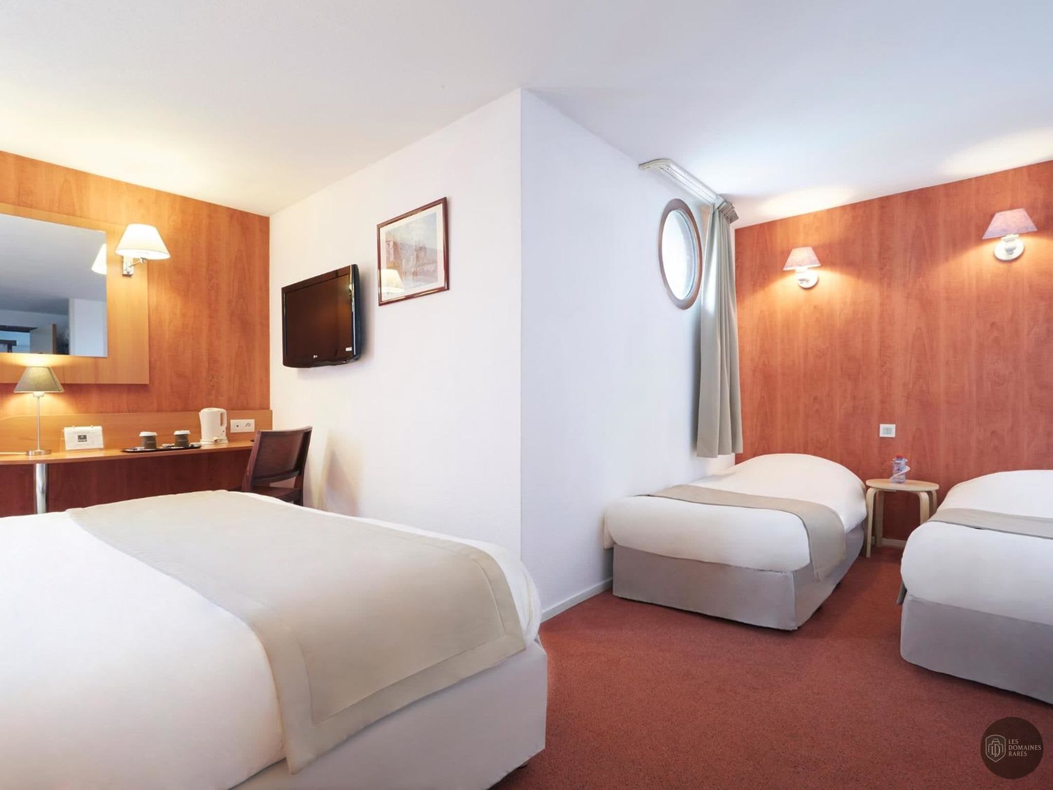 Chambre de l'hôtel Kyriad Caen Sud - Ifs à Ifs en Normandie