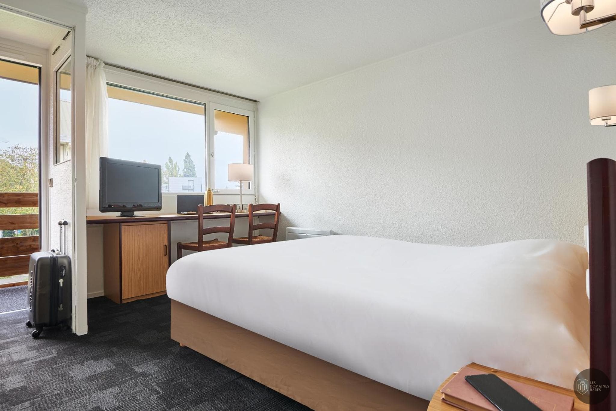 Vue extérieure de l'hôtel Kyriad Direct Evreux à Evreux en Normandie