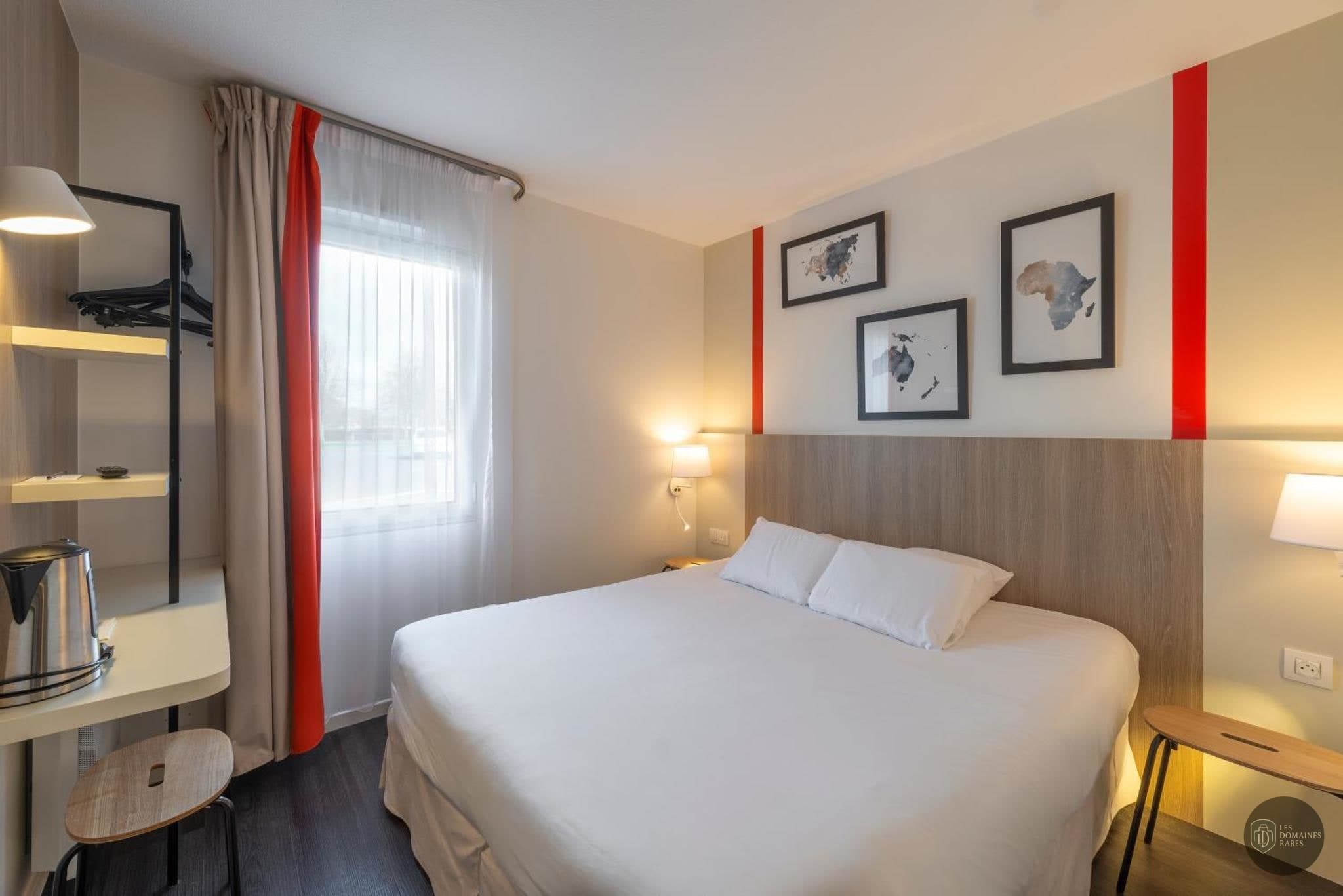 Chambre de l'hôtel Kyriad La Flèche à La en Pays de la Loire