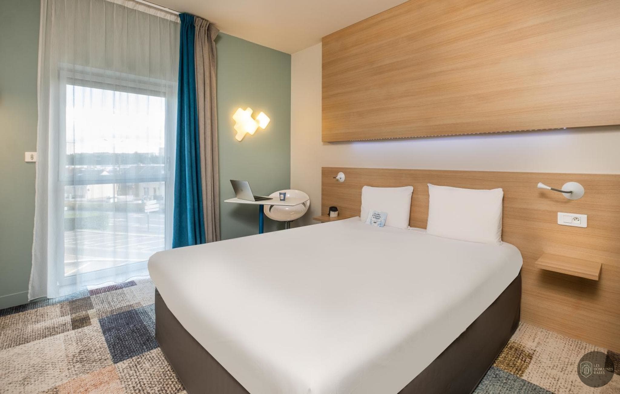 Chambre de l'hôtel Kyriad Le Mans Est à Le en Pays de la Loire