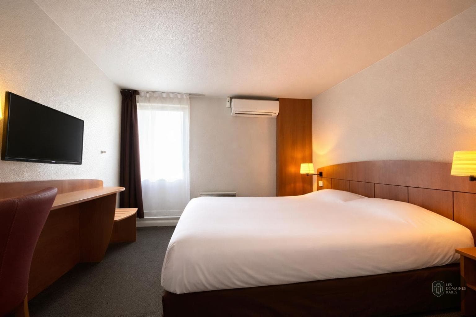 Chambre de l'hôtel Kyriad Montargis à Amilly en Centre-Val de Loire