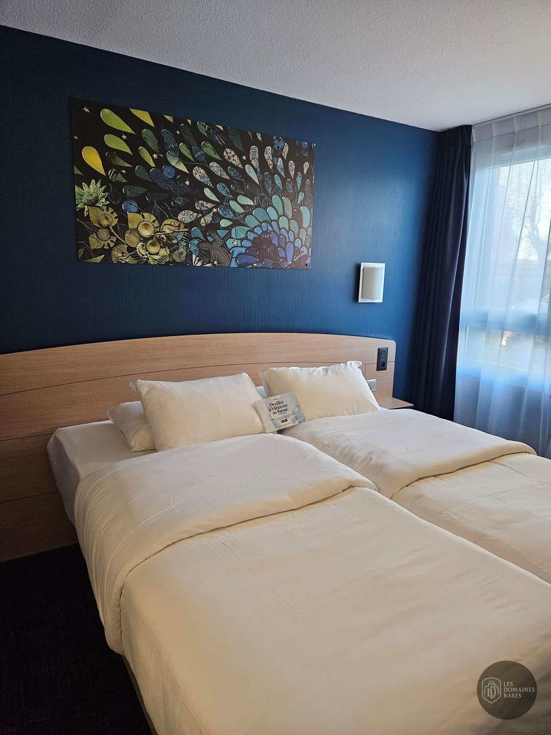Chambre avec deux lits simples