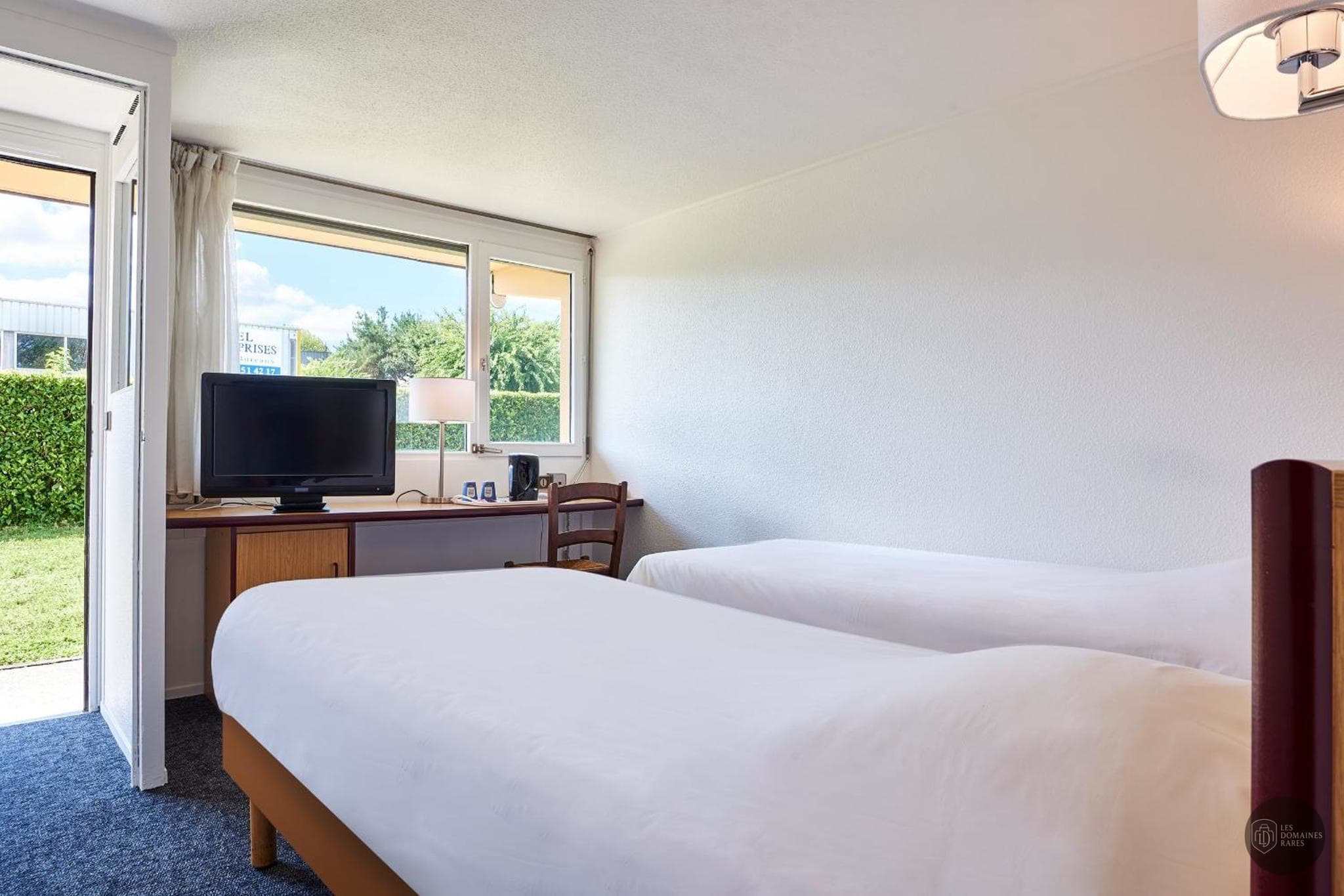 Chambre de l'hôtel Kyriad Tarbes Bastillac à Tarbes en Occitanie - séminaire hautes-pyrénées