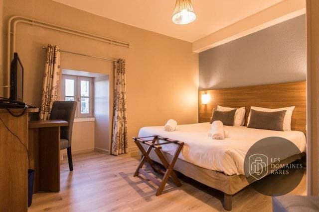 Chambre de l'hôtel La Bastide de Sanilhac à Sanilhac en Auvergne-Rhône-Alpes