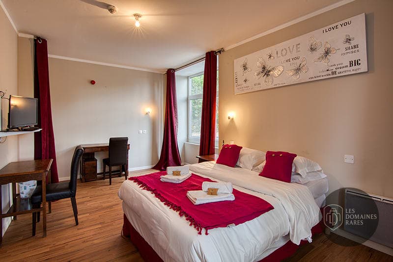 Chambre de l'hôtel La Beauronne à Chancelade en Nouvelle-Aquitaine