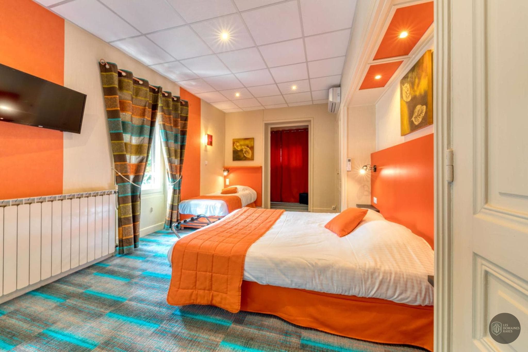 Chambre de l'hôtel La Commanderie Champarey en Auvergne-Rhône-Alpes - séminaire isère