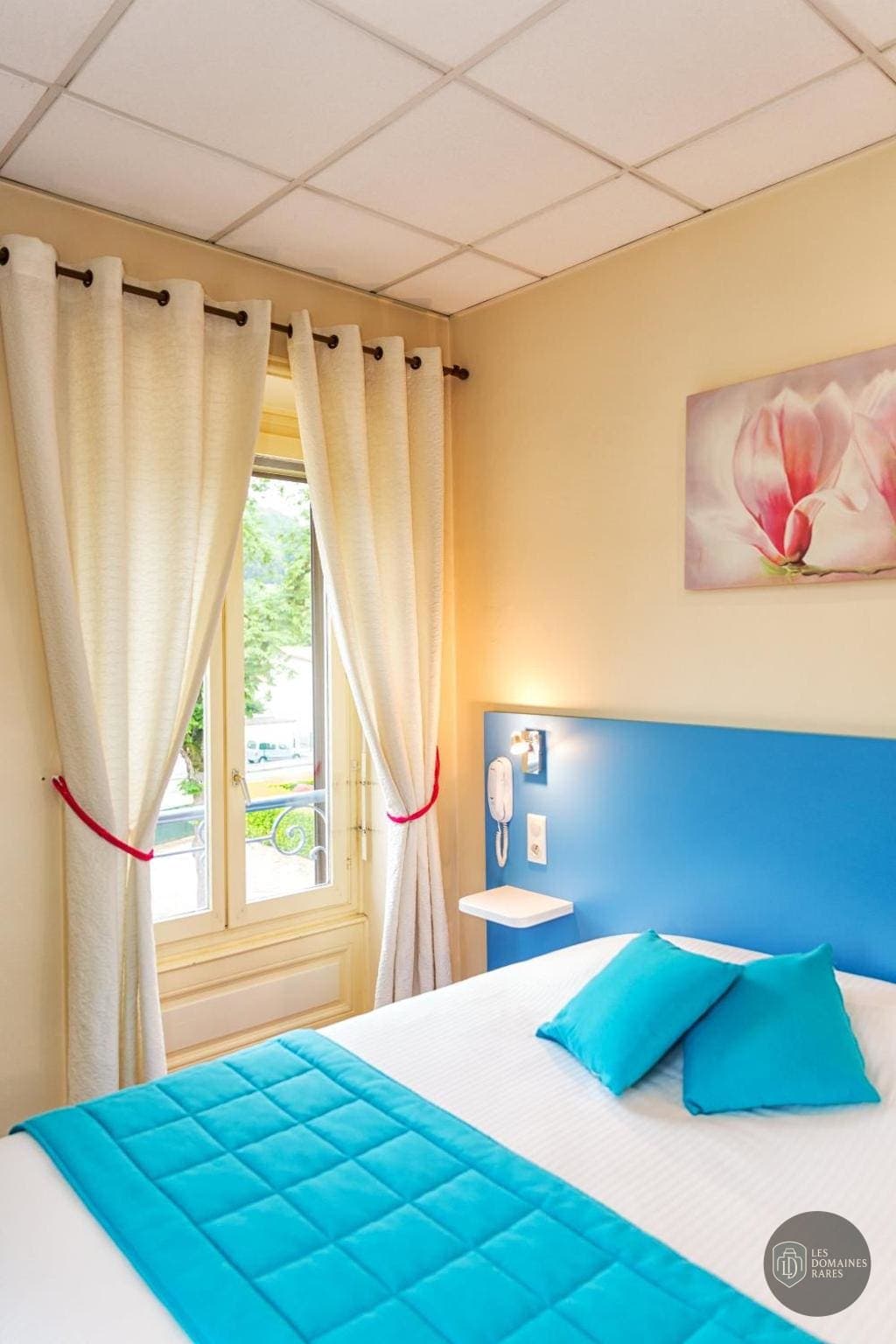 Chambre de l'hôtel La Commanderie Champarey en Auvergne-Rhône-Alpes