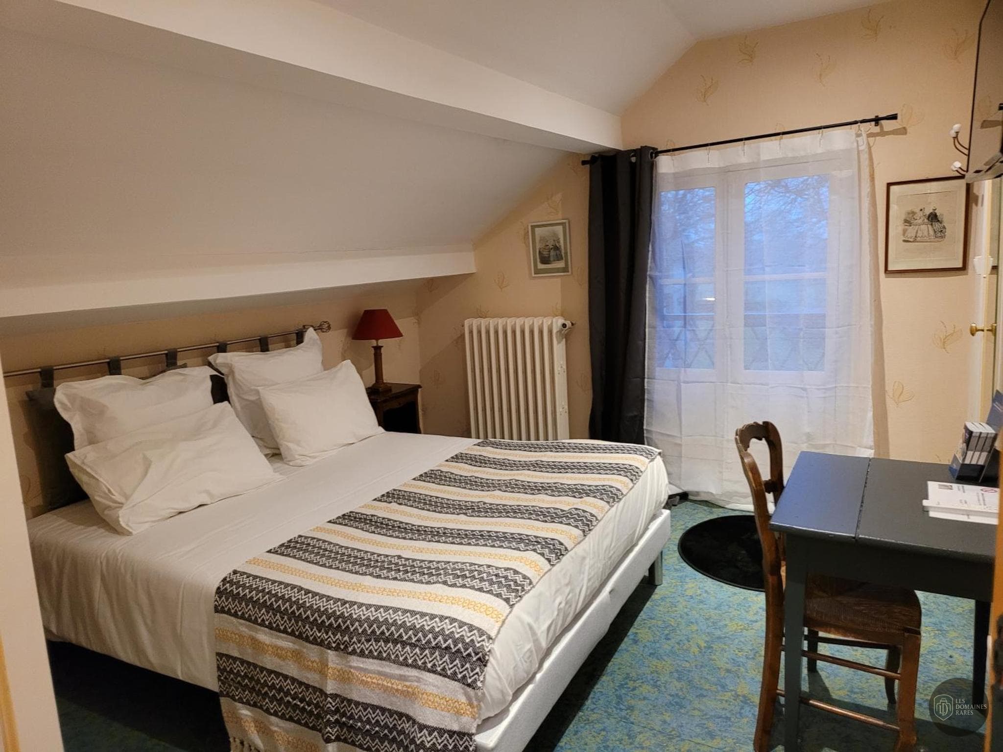 Chambre de l'hôtel Le Chalet de Montegut à Coulandon en Auvergne-Rhône-Alpes - séminaire allier