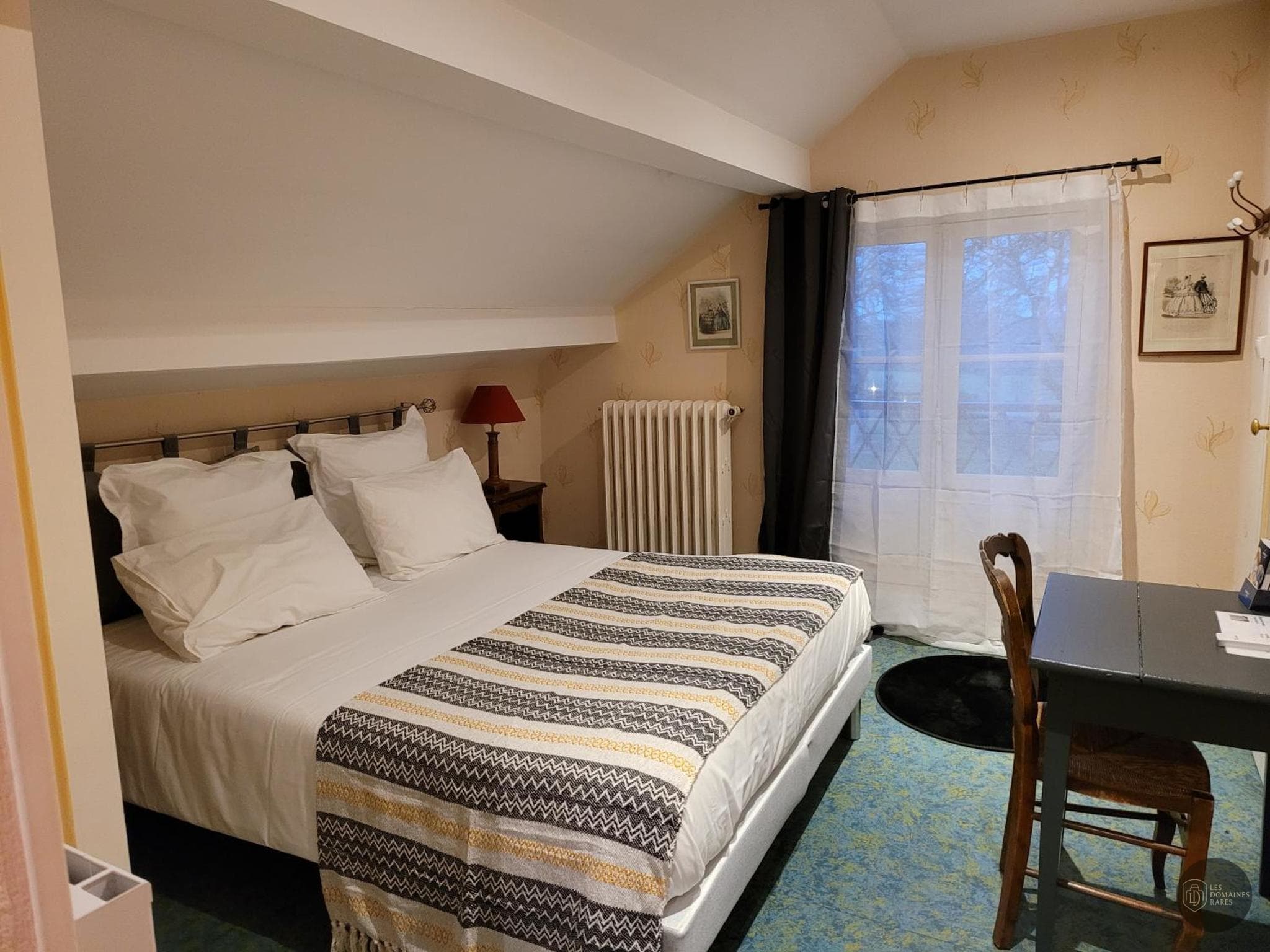 Chambre de l'hôtel Le Chalet de Montegut à Coulandon en Auvergne-Rhône-Alpes