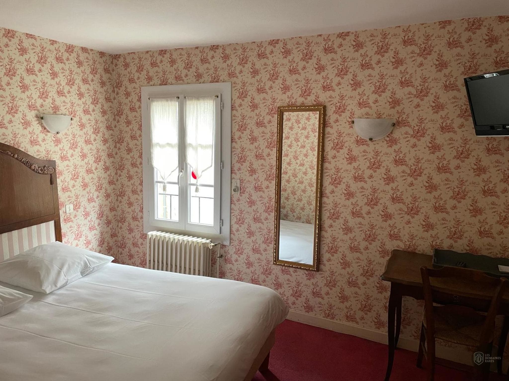 Chambre du lieu Le Coq d'Or à Chénérailles en Nouvelle-Aquitaine