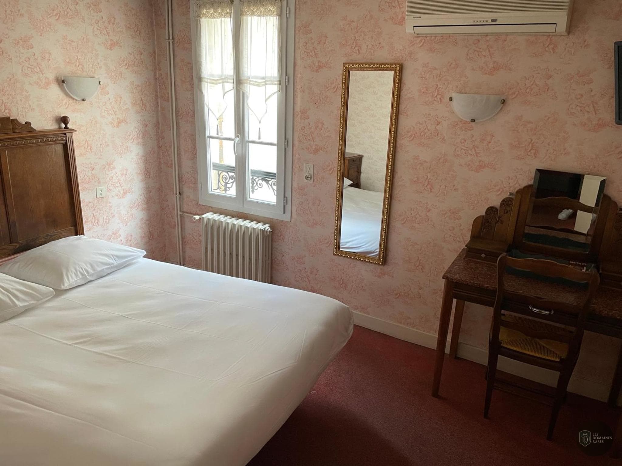 Chambre du lieu Le Coq d'Or à Chénérailles en Nouvelle-Aquitaine