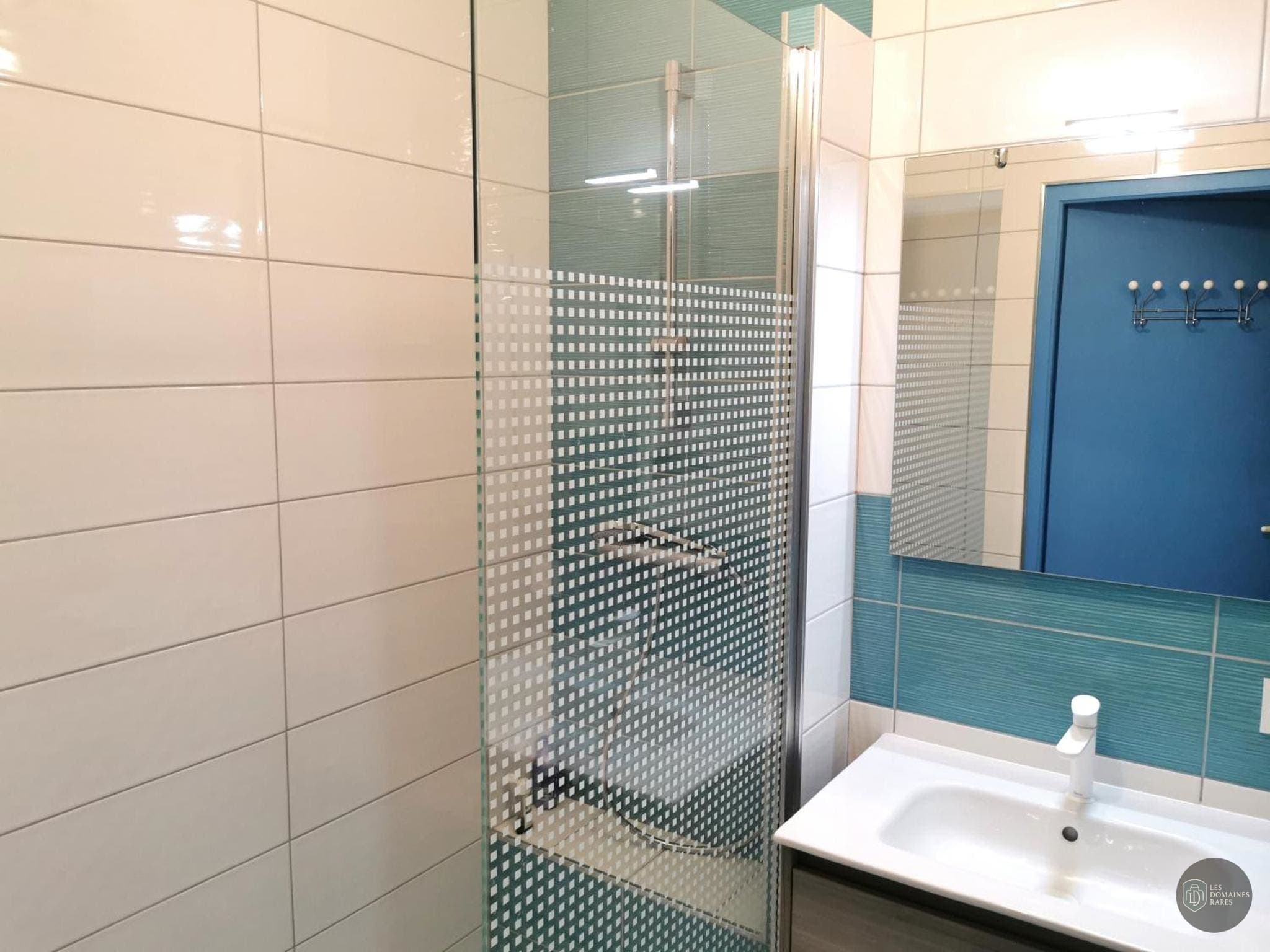 Salle de bain du lieu Le Lagon Bleu à Latilly en Hauts-de-France