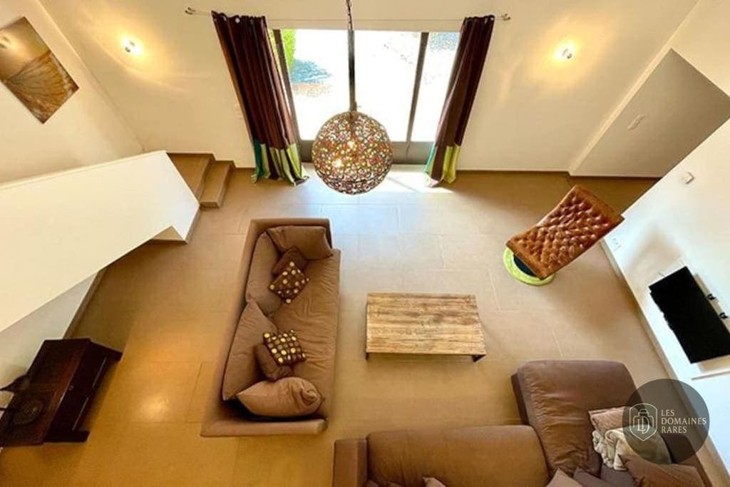 Espace intérieur de l'hôtel Le Mas de l'Olivier en Occitanie
