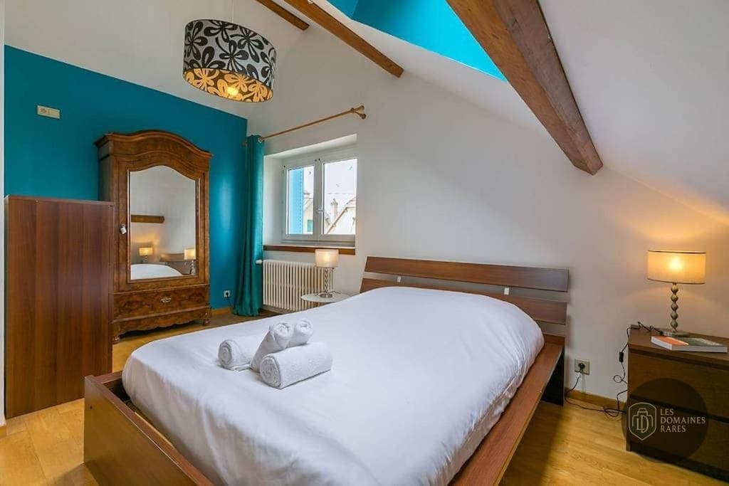 Chambre de l'hôtel Le Montrachet en Bourgogne-Franche-Comté