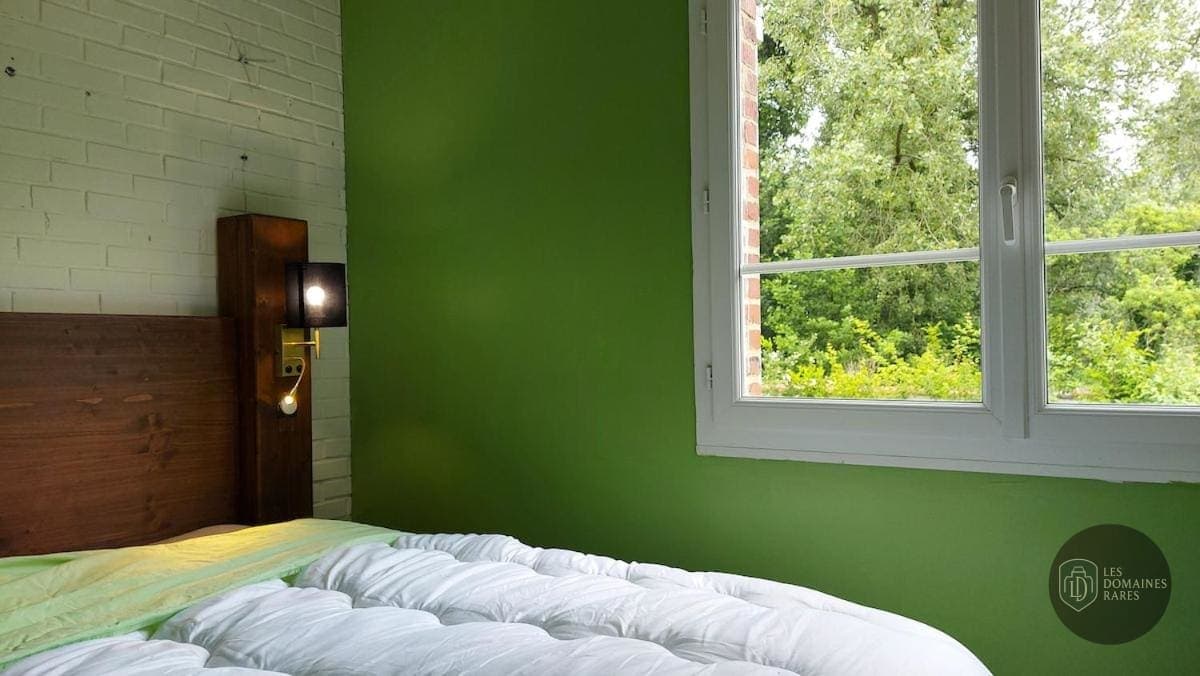 Chambre du moulin Le Moulin de la Mangue en Bourgogne-Franche-Comté - séminaire haute-saône (70)