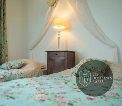 Chambre du moulin Le Moulin des Noues en Île-de-France - séminaire vert-le-petit