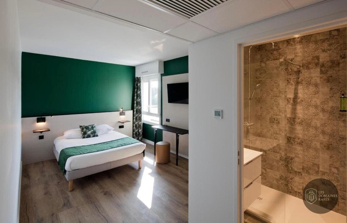 Chambre de l'hôtel Le Riccoty à Blyes en Auvergne-Rhône-Alpes - séminaire ain