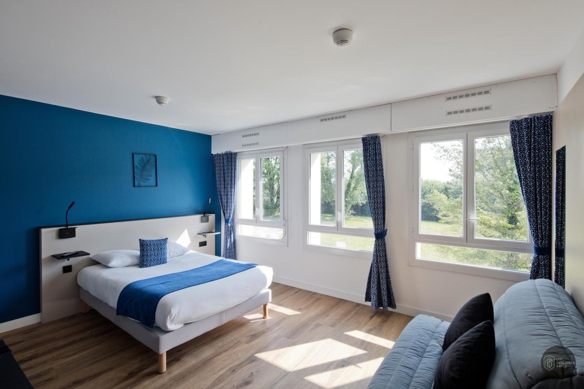 Chambre de l'hôtel Le Riccoty à Blyes en Auvergne-Rhône-Alpes