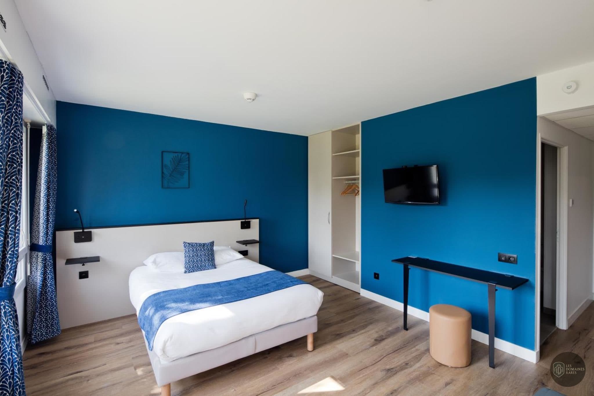Chambre de l'hôtel Le Riccoty à Blyes en Auvergne-Rhône-Alpes