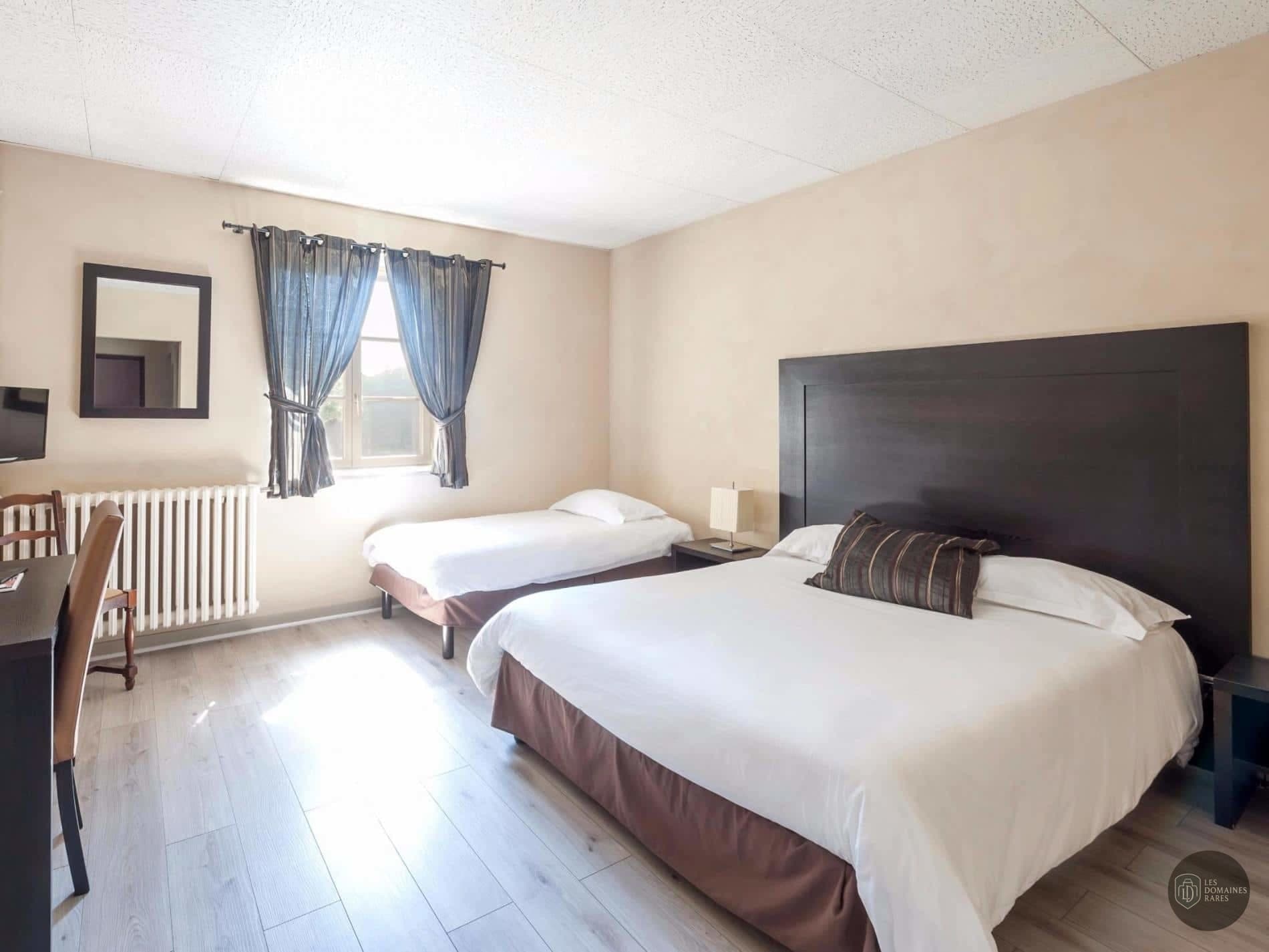 Chambre familiale avec deux lits