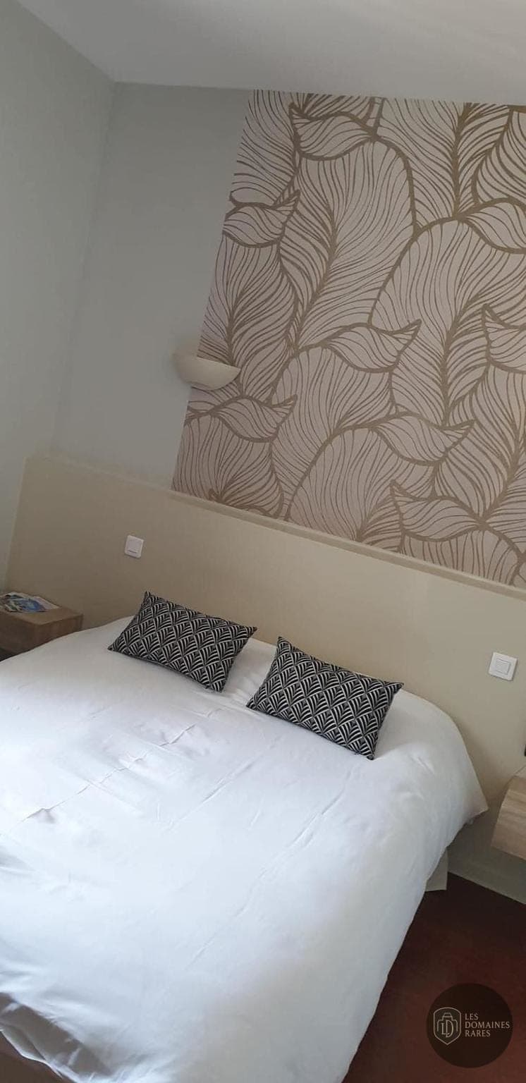 Chambre de l'hôtel Le Tournedos en Occitanie