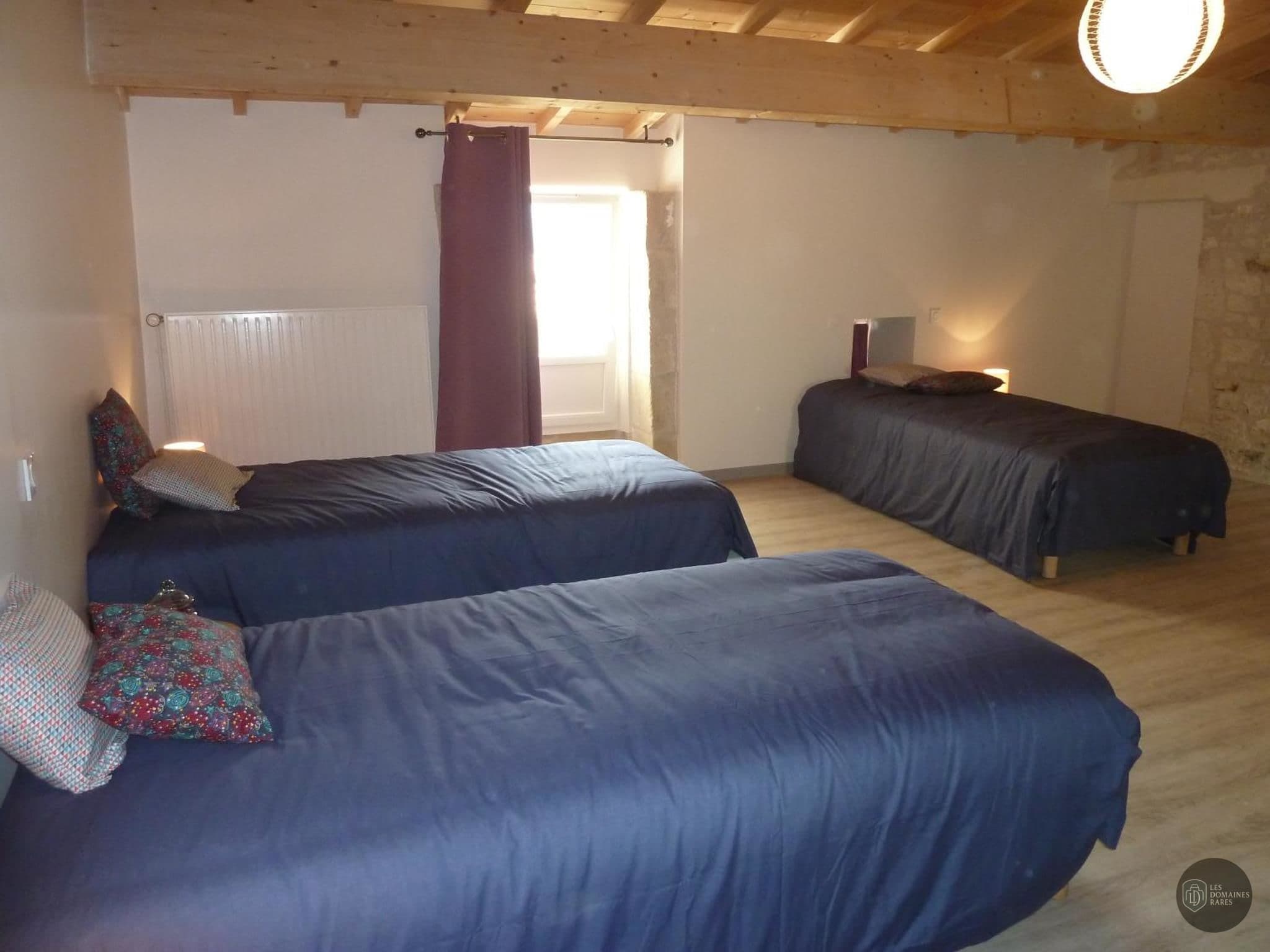 Chambre de l'hôtel Les 4 Petits Cochons à Toulouse en Occitanie