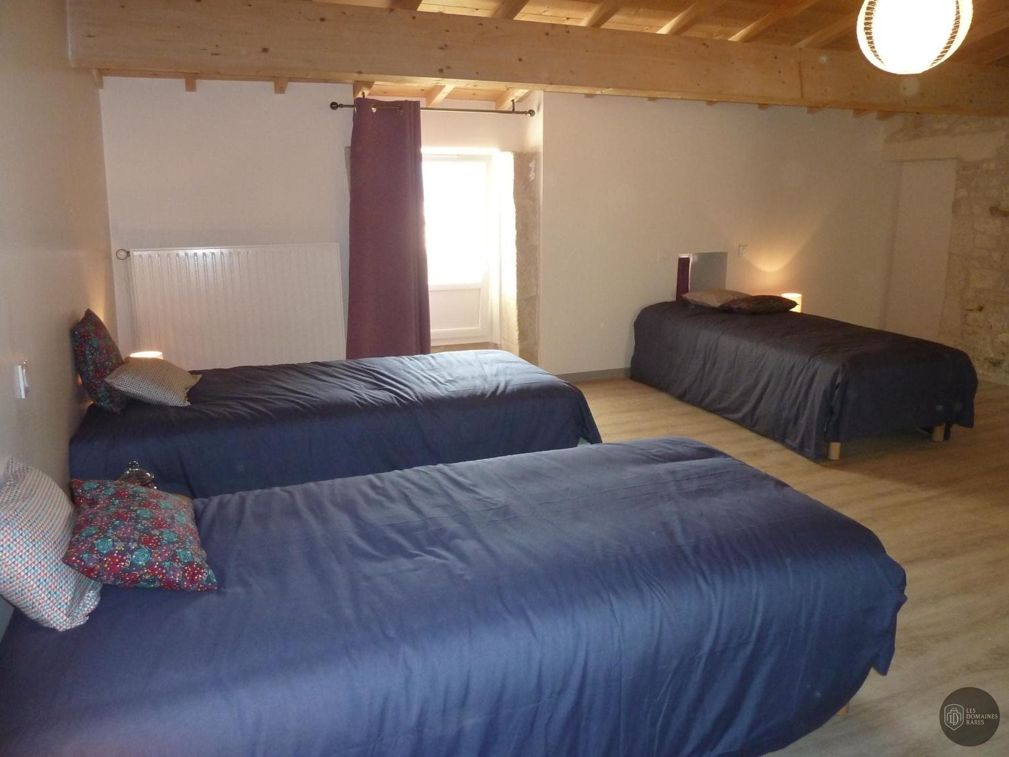 Chambre de l'hôtel Les 4 Petits Cochons à Toulouse en Occitanie