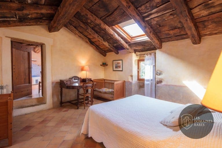 Chambre de la ferme Les Fermes de Rieumal en Occitanie - séminaire lasalle