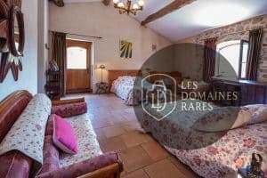Chambre de la ferme Les Fermes de Rieumal en Occitanie