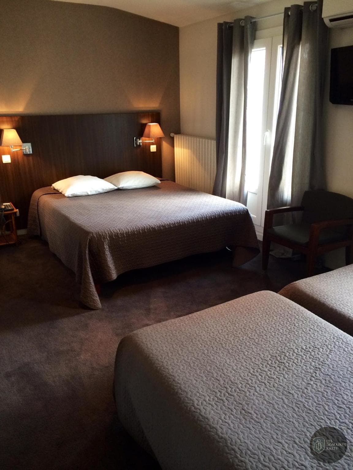 Chambre de l'hôtel Les Négociants à Valence en Auvergne-Rhône-Alpes - séminaire drôme
