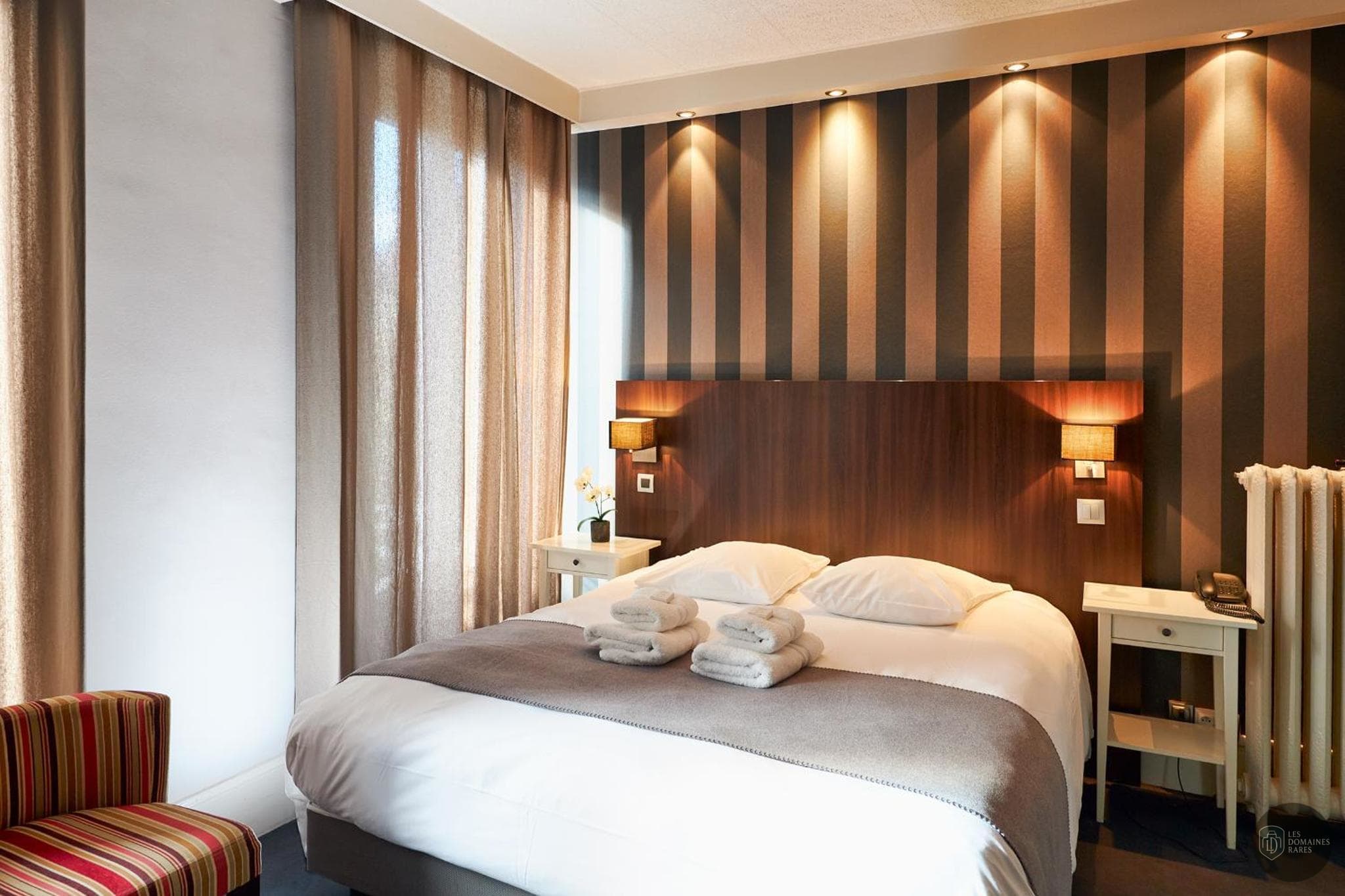 Chambre de l'hôtel Les Négociants à Valence en Auvergne-Rhône-Alpes