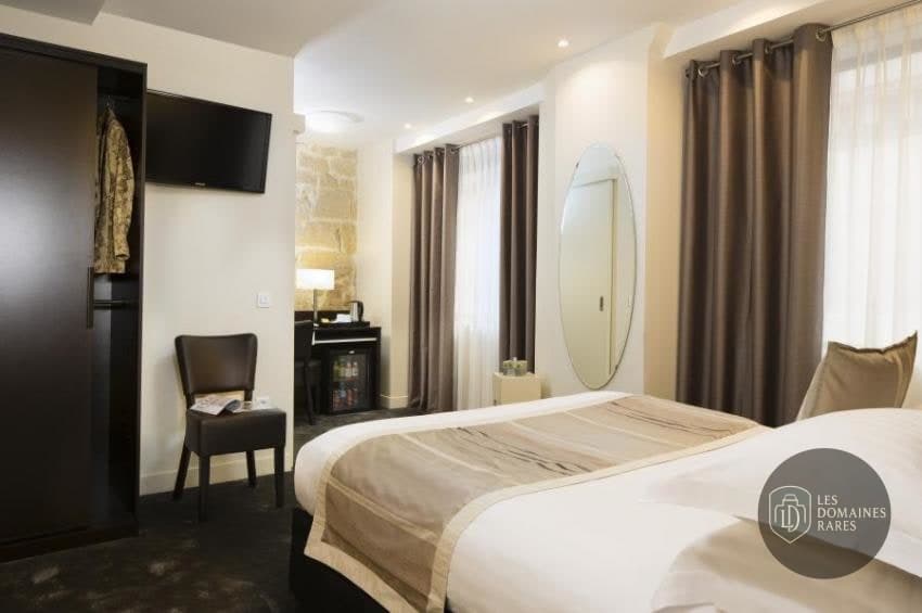 Chambre de l'hôtel Lion d'Or en Nouvelle-Aquitaine - séminaire manzac-sur-vern, france