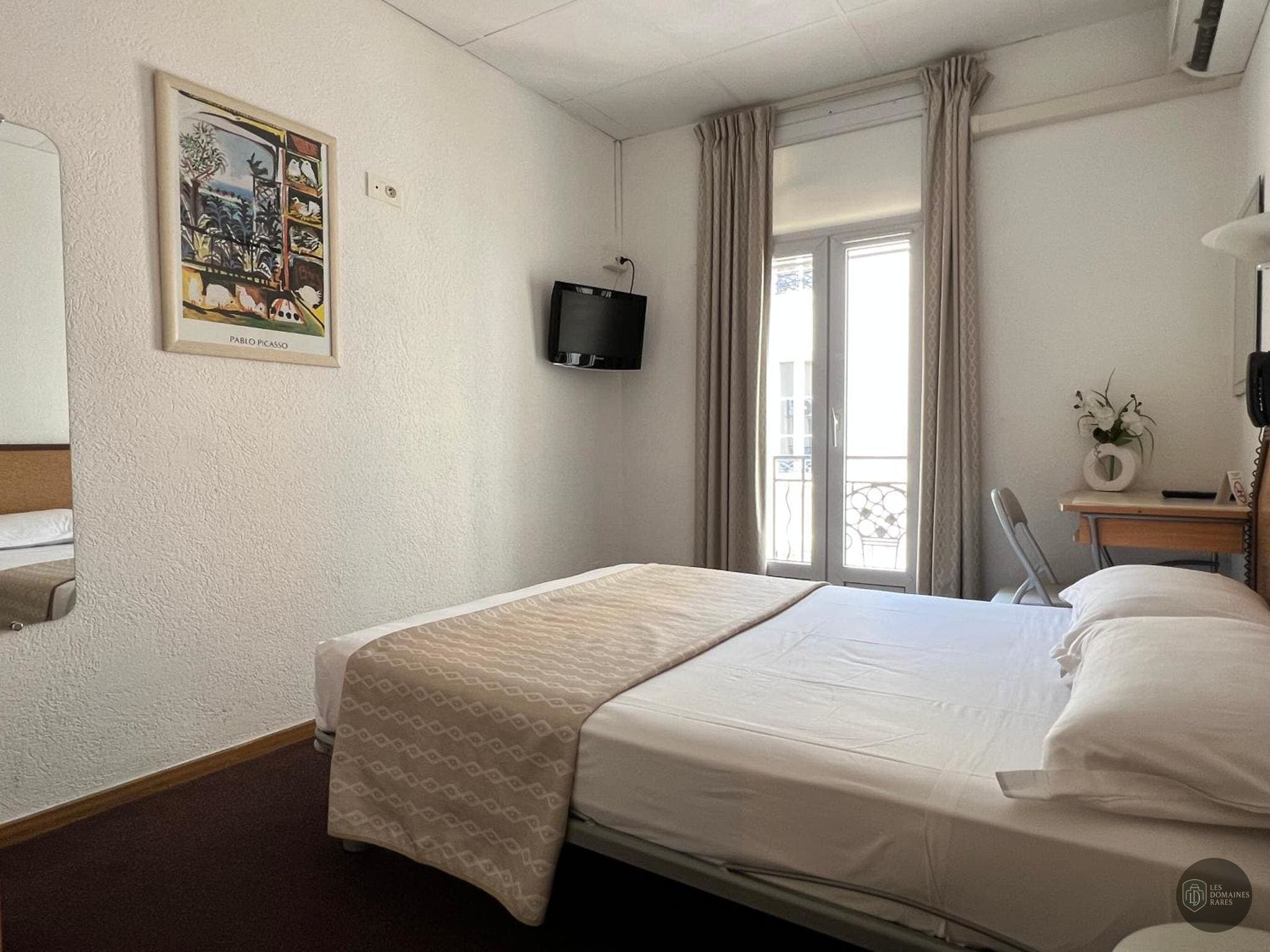 Chambre de l'hôtel Little Palace Hôtel à Paris en Île-de-France