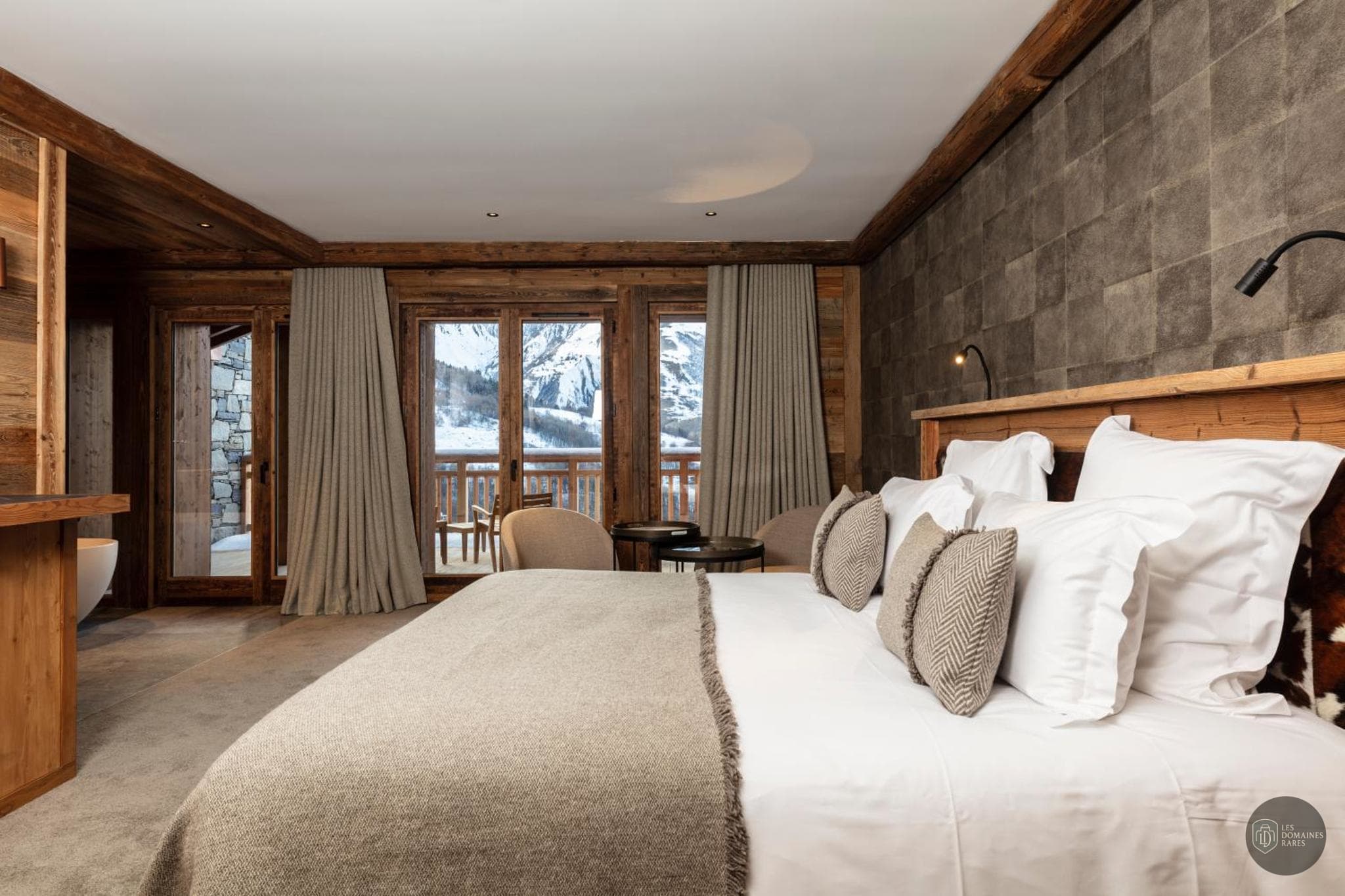 Chambre de l'hôtel M Lodge et Spa à Val en Auvergne-Rhône-Alpes