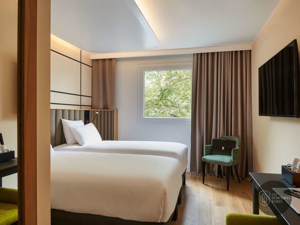 Chambre avec deux lits simples
