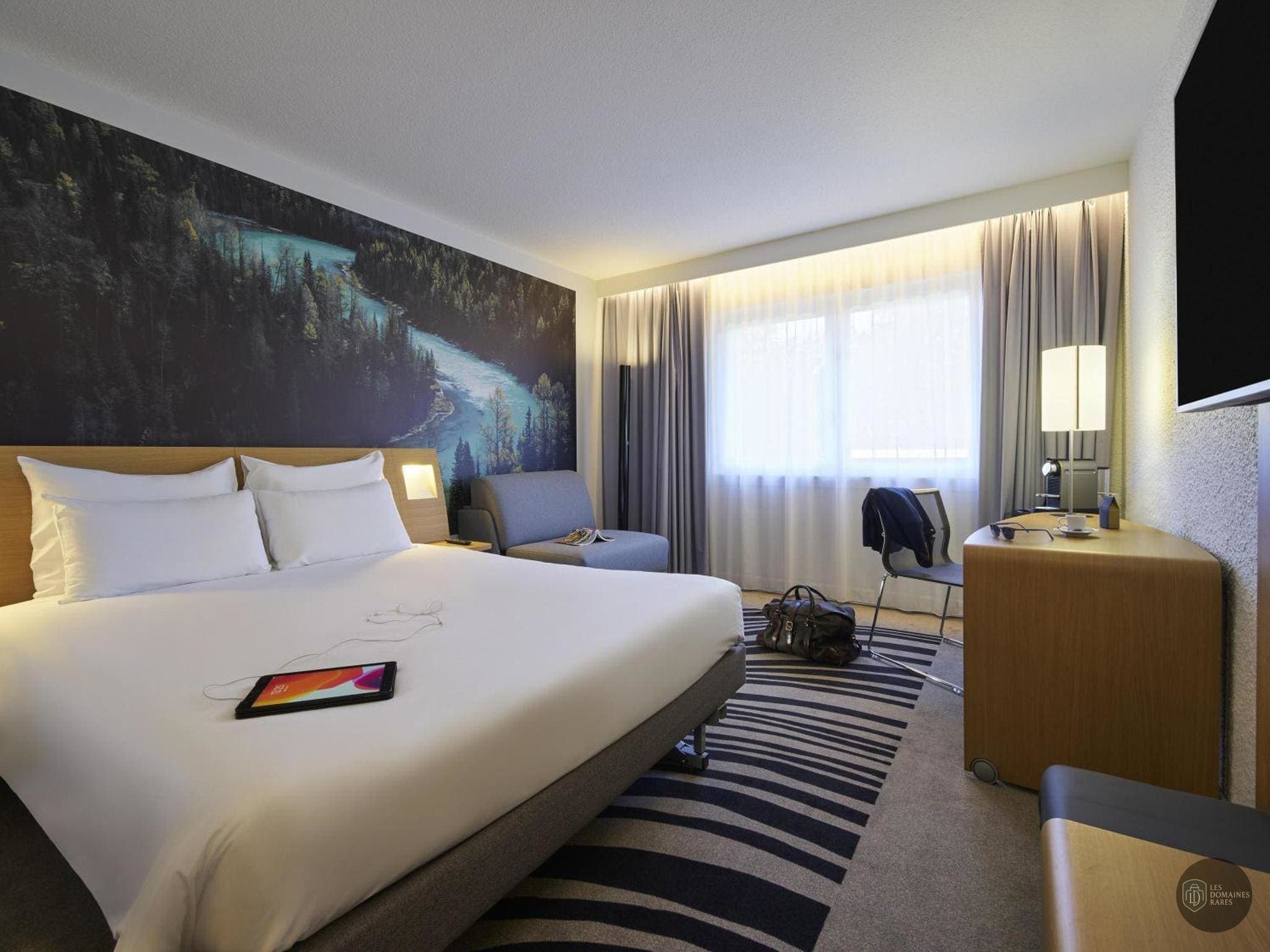 Chambre de l'hôtel Novotel Massy Palaiseau à Palaiseau en Île-de-France