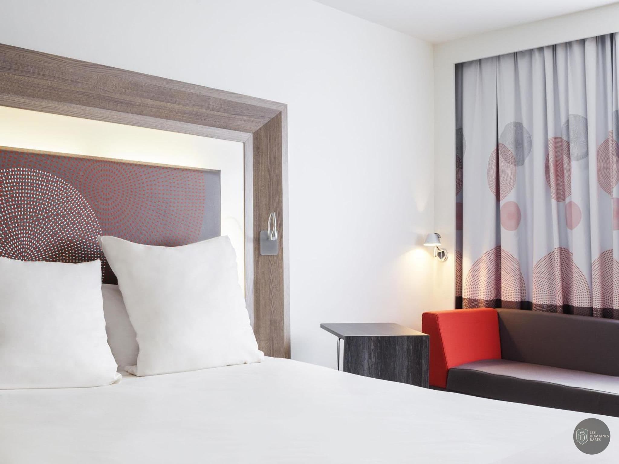 Chambre de l'hôtel Novotel Massy Palaiseau à Palaiseau en Île-de-France