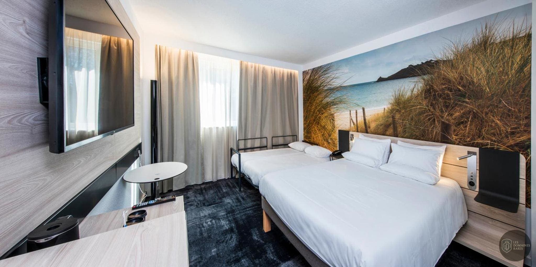 Vue extérieure de l'hôtel Novotel Rennes Alma à Rennes en Bretagne