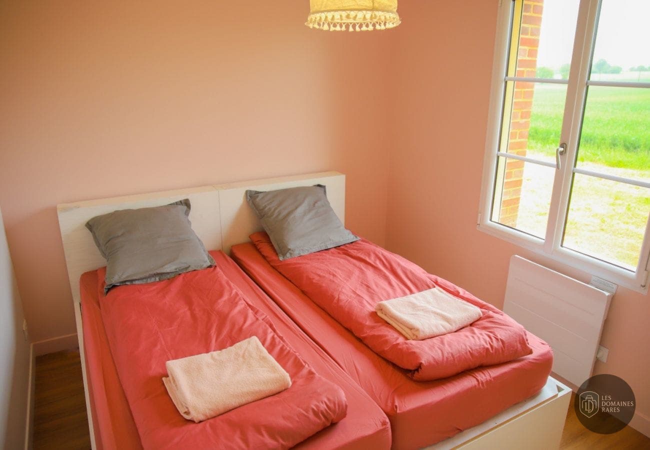 Chambre avec deux lits simples