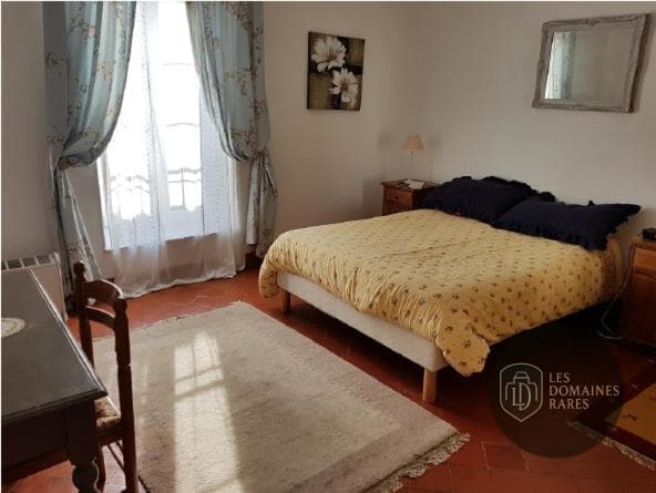 Chambre du moulin Vamos Padel Magalas à Magalas en Occitanie - séminaire hérault