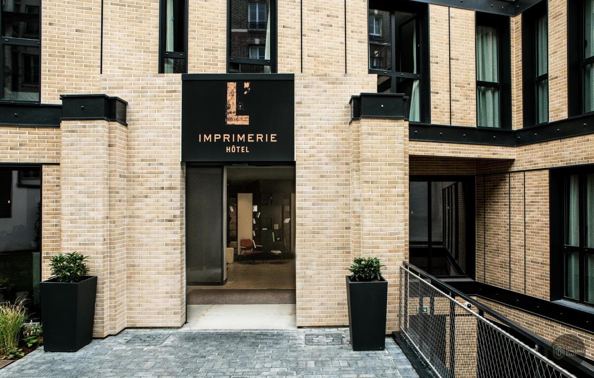 Vue extérieure de l'hôtel L'Imprimerie Hôtel à Clichy en Île-de-France